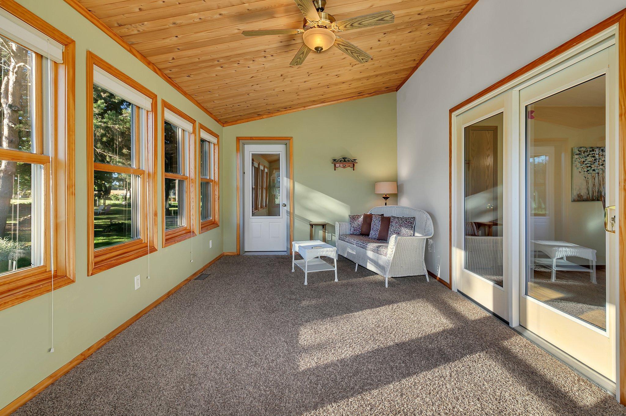 Vaulted knotty pine ceiling in the four season porch.