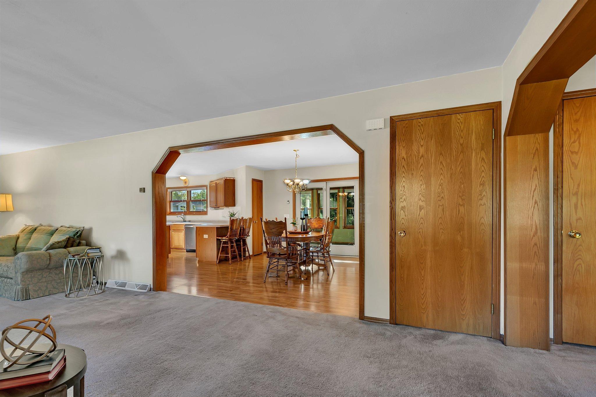 View of the Dining Room & Kitchen from the Foyer.