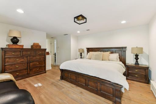 Experience ultimate comfort in this spacious primary bedroom, designed to easily accommodate a king-size bed for your perfect night's sleep.