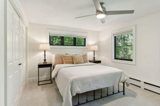 Discover one of four spacious and comfortable upper-level bedrooms all with ample closet storage.