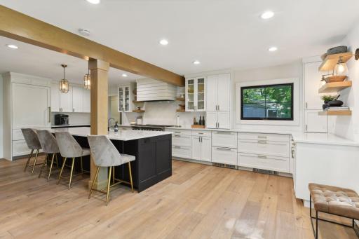 Discover the sleek elegance of modern white cabinetry, offering a timeless look and ample storage to elevate your kitchen design.