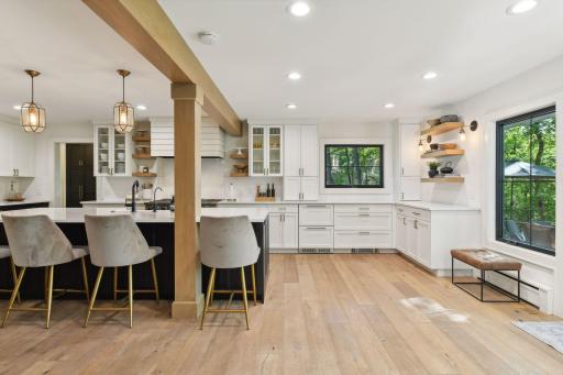 The kitchen was designed for entertainment with a large center island and ample storage including pull out drawers.