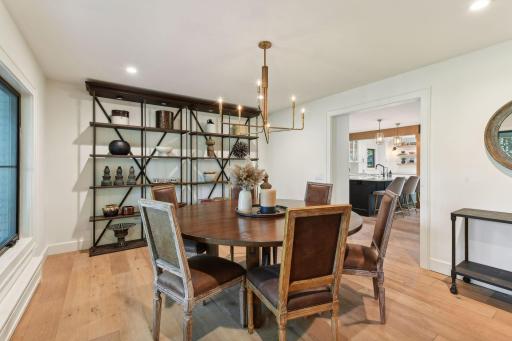 Seamlessly entertain in this formal dining room, perfectly situated just steps from the kitchen for effortless dining experiences.