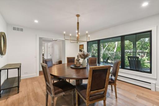 Enjoy elegant dining in a separate formal dining room, perfect for hosting gatherings or intimate dinners, offering a dedicated space for memorable meals and entertaining.