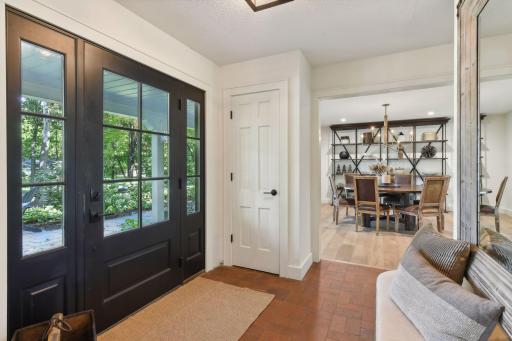 Step through this stunning custom modern entryway, where sleek design meets timeless charm with original wood floors.