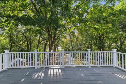 Step out onto a spacious deck, perfect for entertaining, relaxing, and enjoying the great outdoorsâyour personal retreat awaits!
