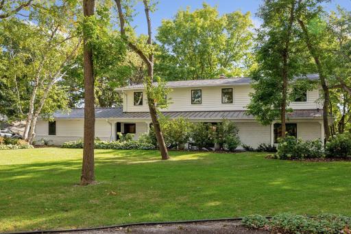 Spacious green front yard, nestled on a sprawling 1.67perfect for outdoor activities and endless possibilities!
