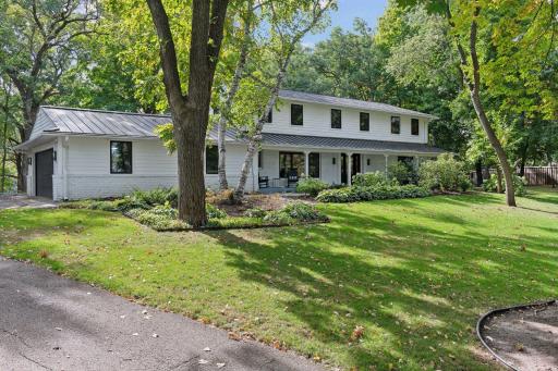 This gorgeous Parkwood Knolls opportunity offers an INCREDIBLE 1.67 acre lot with mature trees, captivating views, and a tranquil pond, offering a serene retreat just moments from urban living.