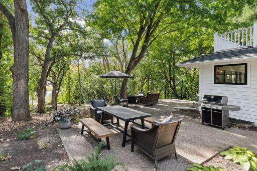 Experience dining al fresco in this charming outdoor space, where you can be one with nature while enjoying meals surrounded by lush greenery.