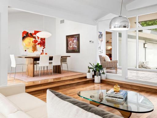 Mid-Century Modern design is characterized by clean lines, organic forms, and a seamless connection between indoor and outdoor spaces, celebrating simplicity and functionality.