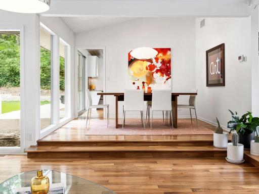 The formal dining room is adjacent to both the kitchen and the living area - great for entertaining!