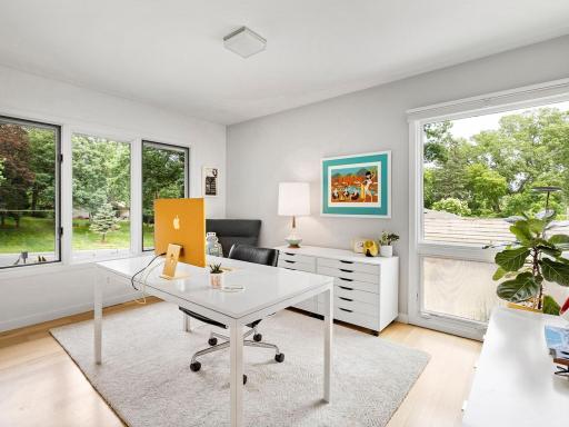 One of three main floor bedrooms, this one currently being used as an office.