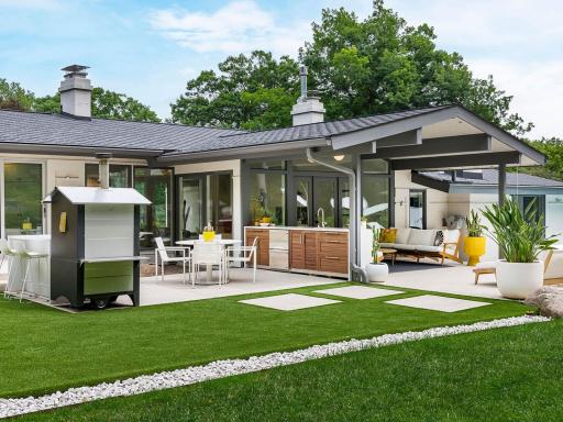 With an outdoor Italian oven, wet bar, refrigerator, and dishwasher, you can entertain in style!