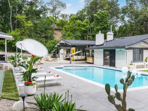 Custom back yard that evokes Palm Spring! No expense was spared in this stunning transformation!