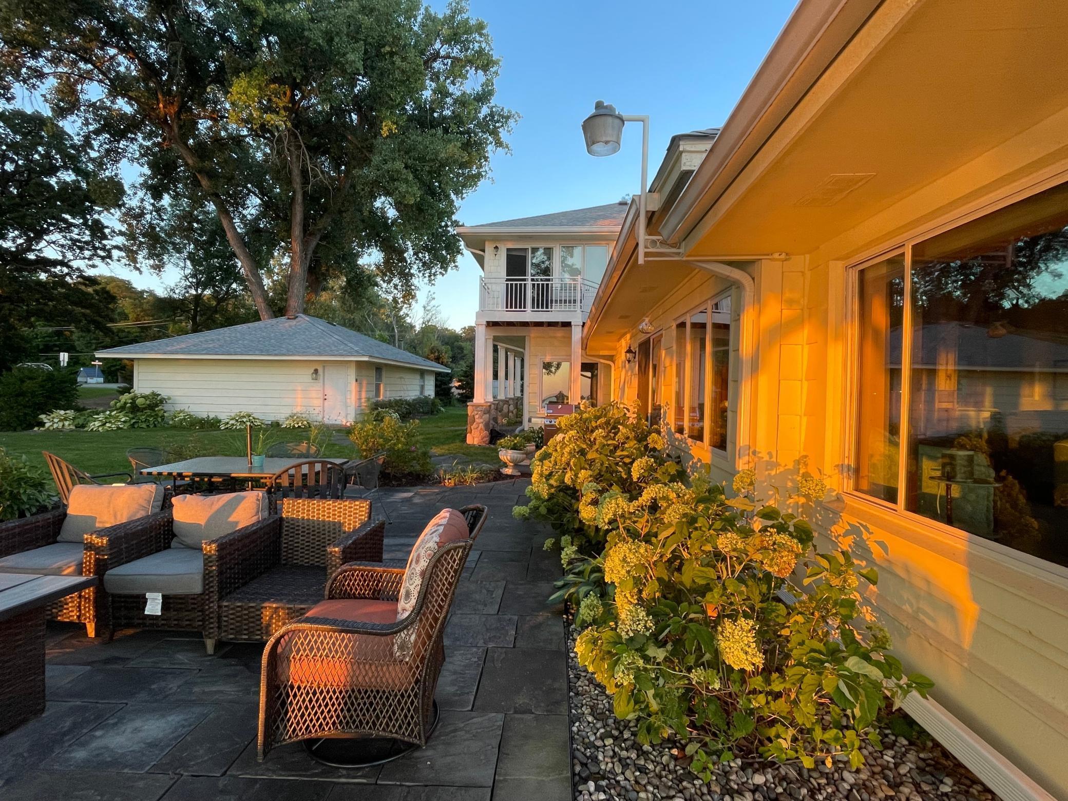 Exterior sun setting on home looking from stones side of house & garage view.jpg