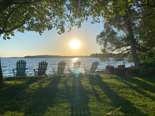 Sunset adirondak chairs with sun in backround.JPG