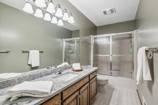 Full Upstairs Bathroom w/ Granite and Tiled Floors
