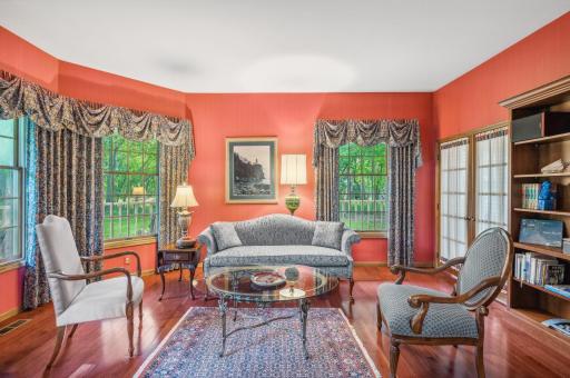 Library/Sitting Room with Cherry Hardwood Floors
