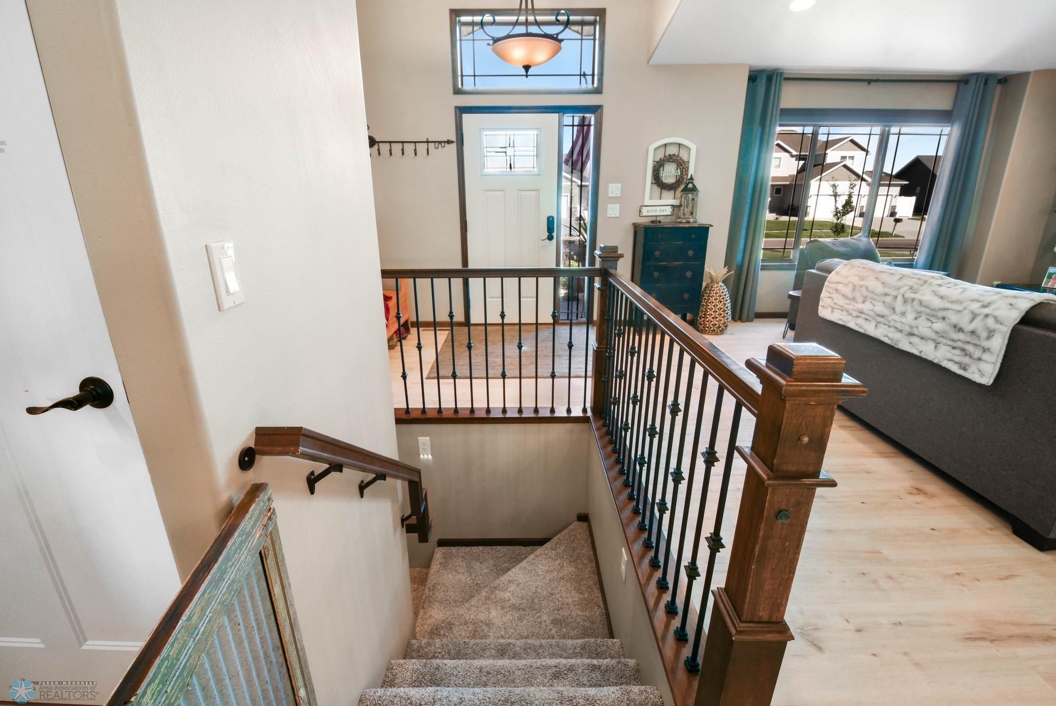 Stairs to basement w/iron spindles