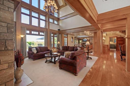 The grand great room welcomes you with a 25-foot vaulted ceiling. The soaring ceilings amplify the sense of openness.