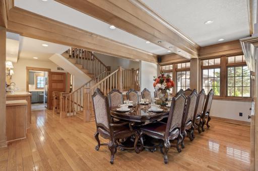 The formal dining room offers captivating views from every seat and includes a built-in buffet bar with a sink.