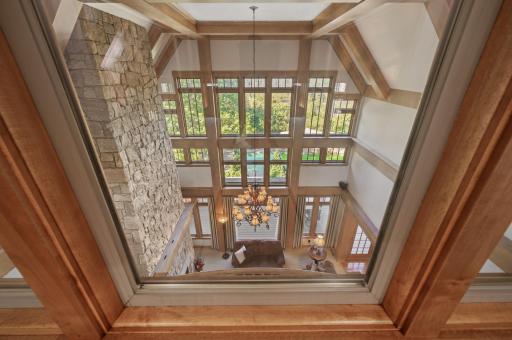 Large windows bring in plenty of natural light, while soft carpeting ensures a comfortable place to sit or sprawl out and enjoy their own corner of the home.