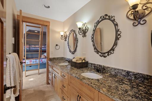 The bedrooms share a Jack and Jill bathroom for added convenience