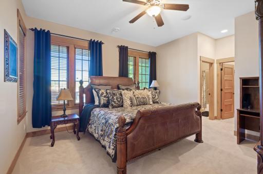 One of 3 lower level bedrooms that are all generously sized with a walk in closet.
