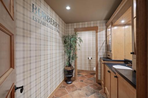 The half bath in the lower level combines style and functionality. It provides easy access for guests and family alike, ensuring comfort during gatherings.
