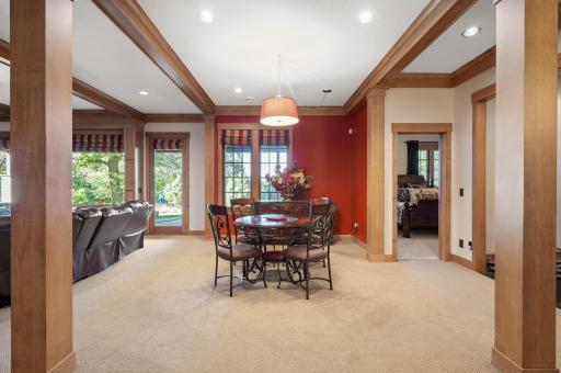 From the lower level walk out, you'll have direct access to the outdoor pool area, hot tub, patios and gardens, making this home an ideal hub for gatherings and summer fun.