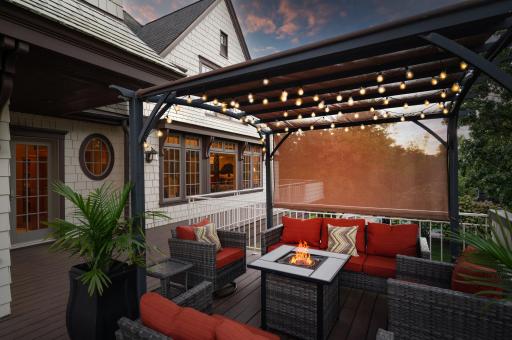 Enjoying a morning coffee or evening sunset on this simply unforgettable deck, making it a true highlight of the home.