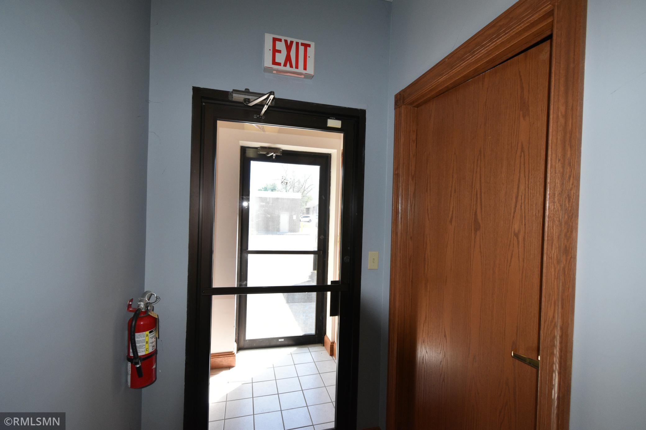 Double glass doors to enter from the back of the building.