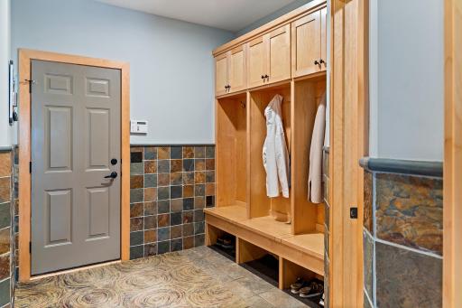 Mud room off garage and adjacent laundry room