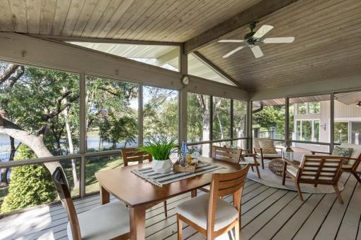 Screened in Porch has plenty of room for a table and seating area