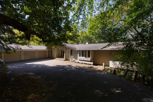 Large driveway with 3-car Garage and Ample Space for Parking
