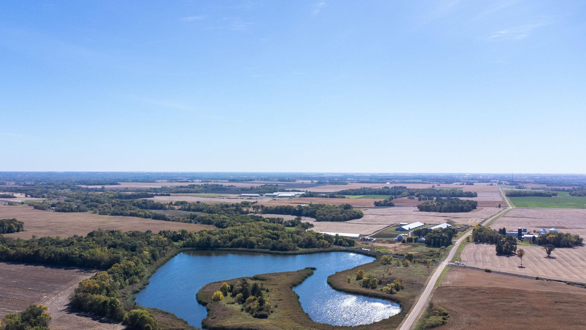 Aerial view of the pond and woods.