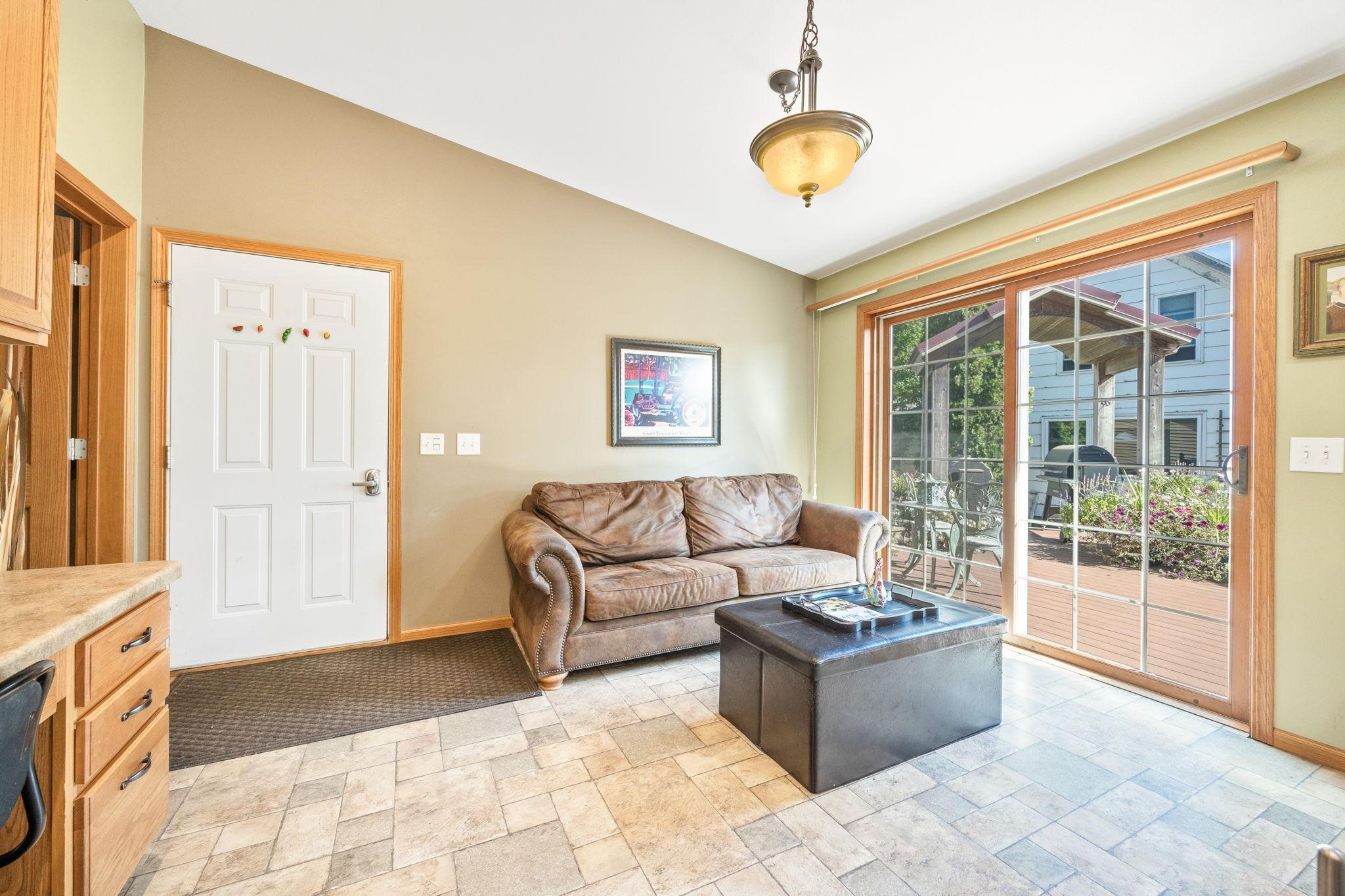 The owners use this room off of the kitchen for their sitting room, enjoying their morning coffee.