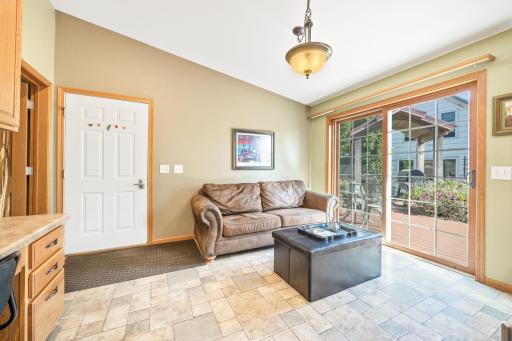 The owners use this room off of the kitchen for their sitting room, enjoying their morning coffee.