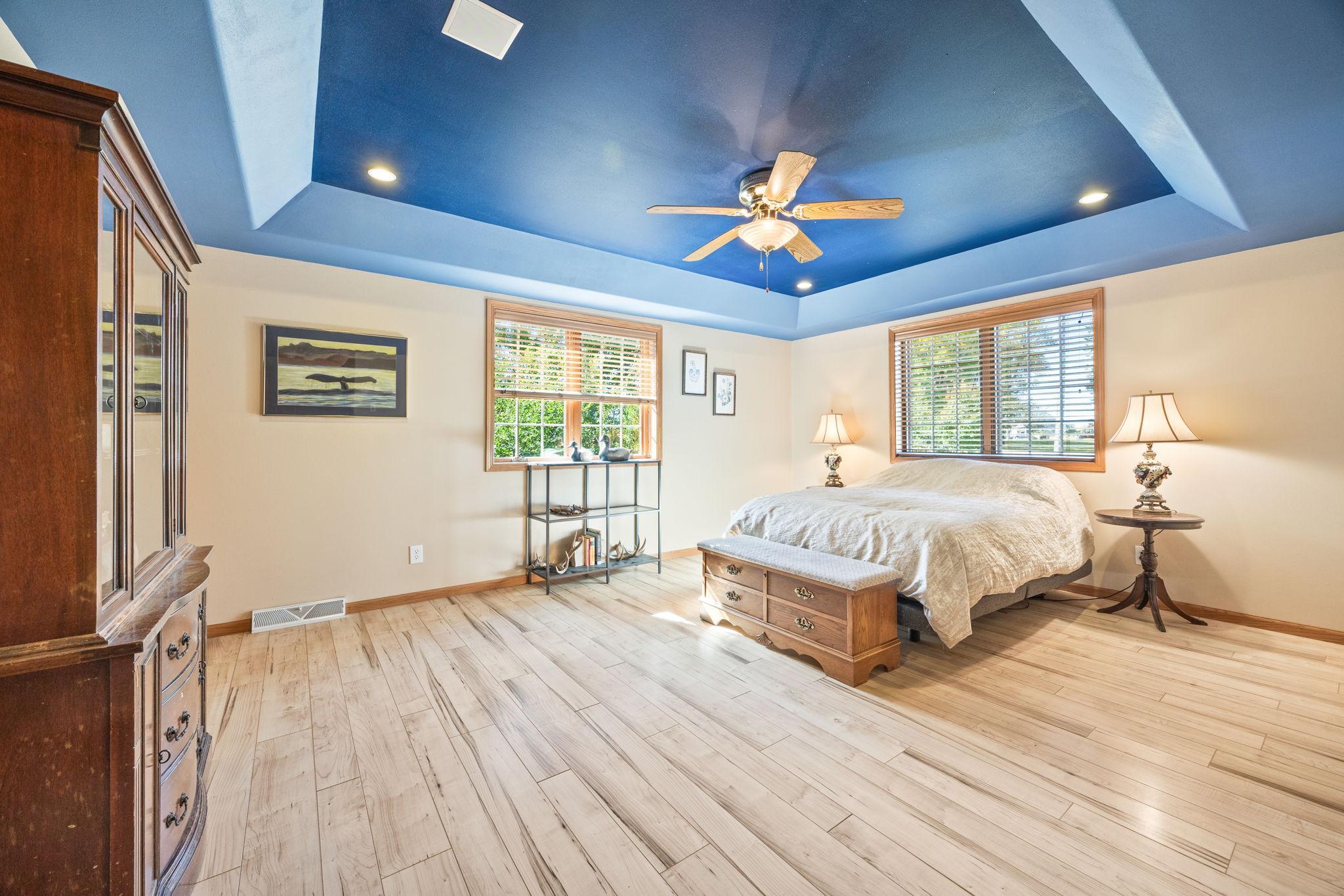 Primary bedroom with tray vault.