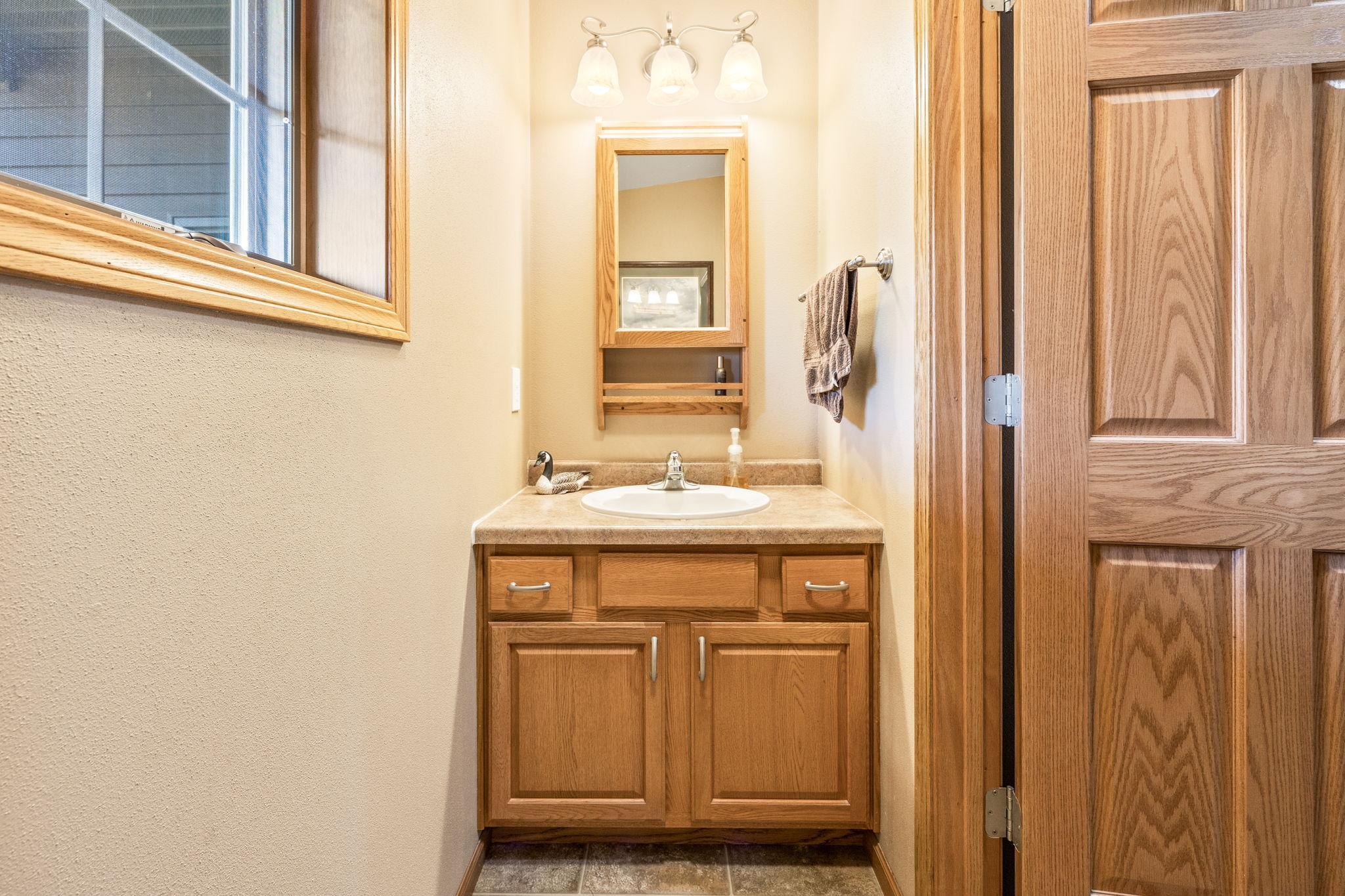 Half-bathroom off of the laundry room.