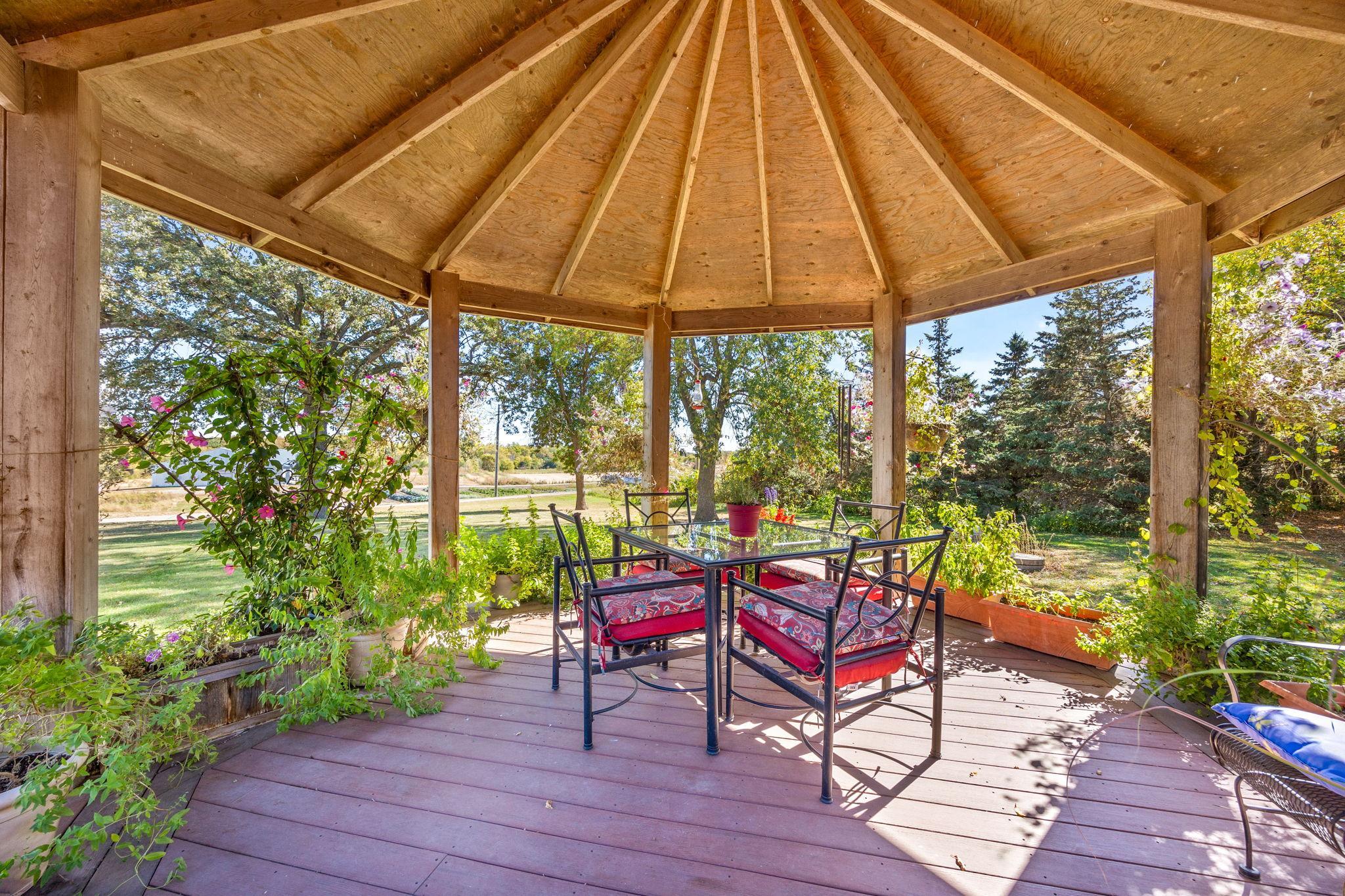 The gazebo in the backyard. Great area to relax or entertain.