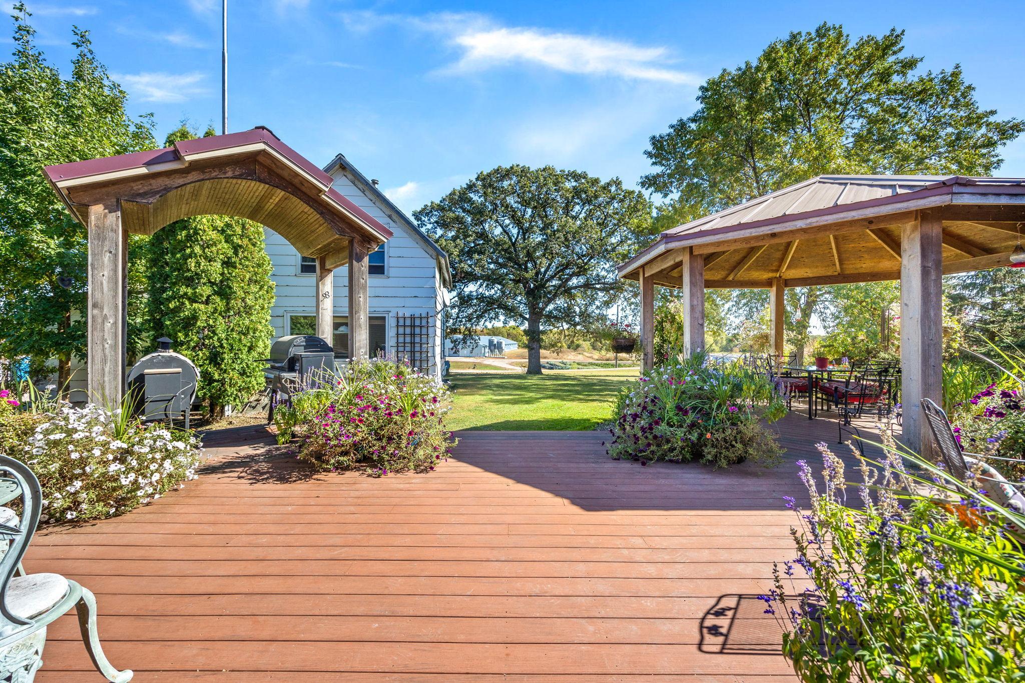 Backyard deck with gazebo, and roof to cover grills.