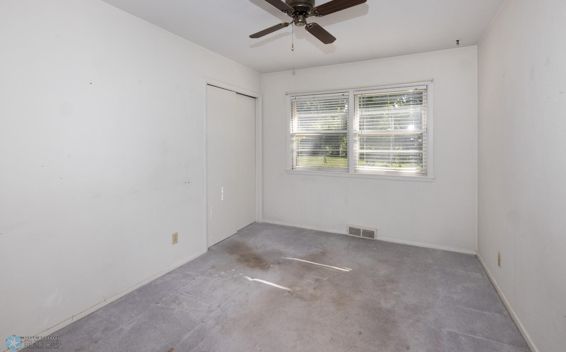 Bedroom - hardwood underneath carpet