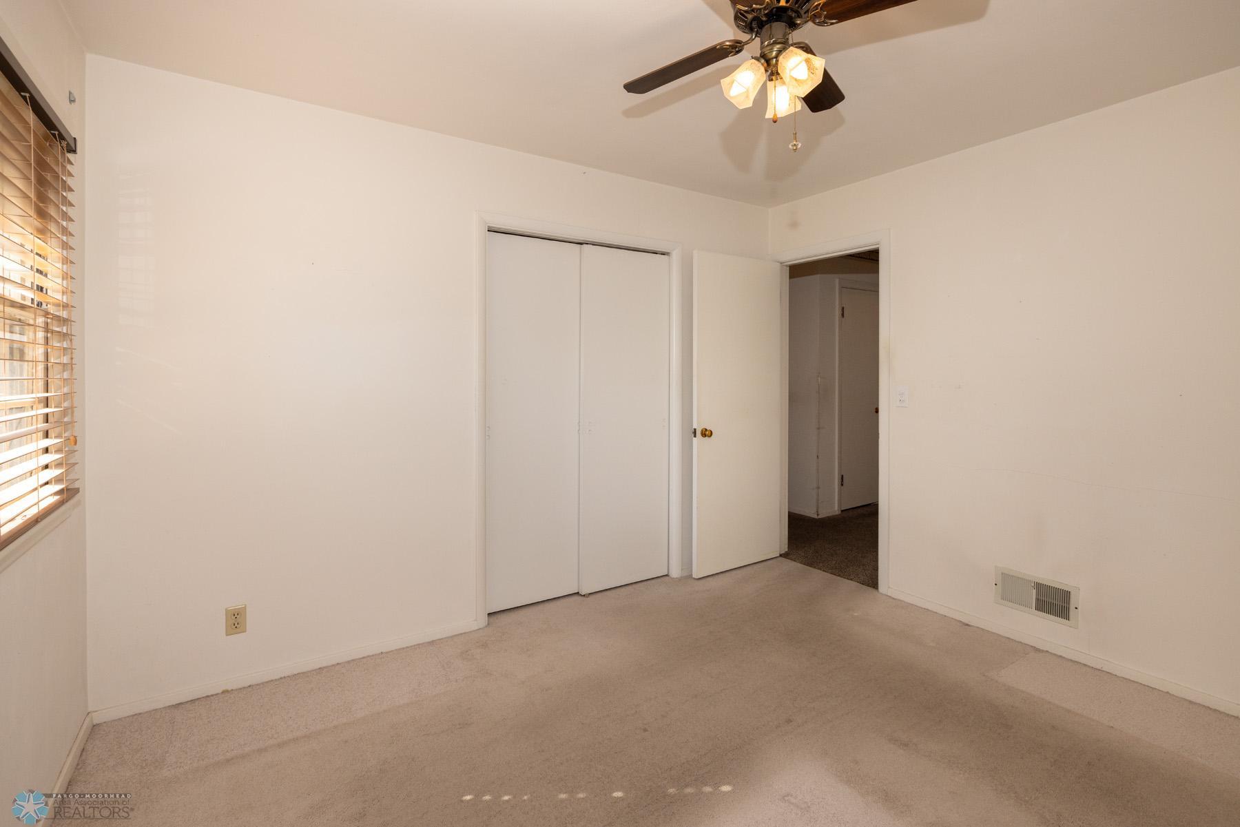 Bedroom - hardwood underneath carpet