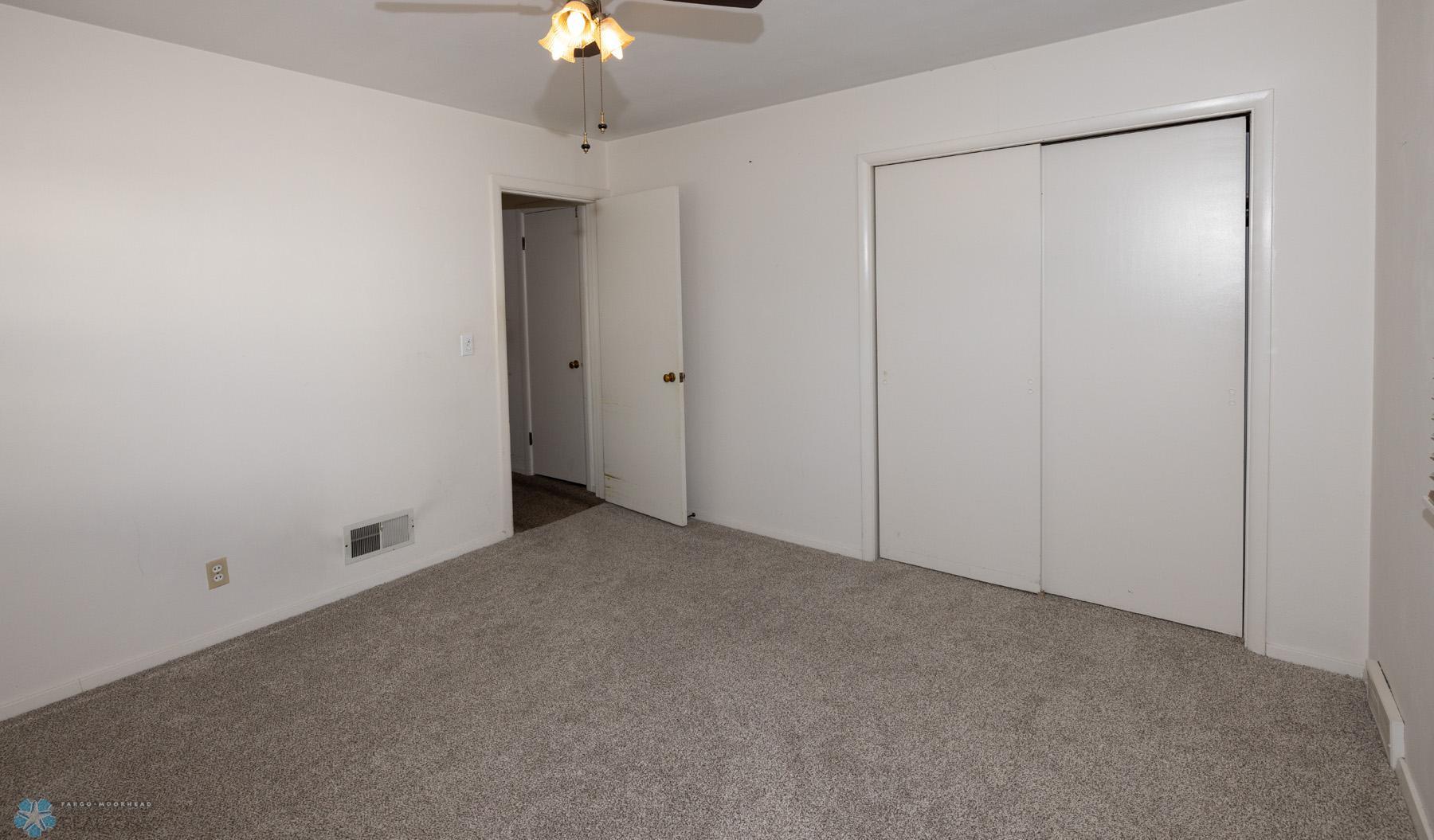 Bedroom - hardwood underneath carpet