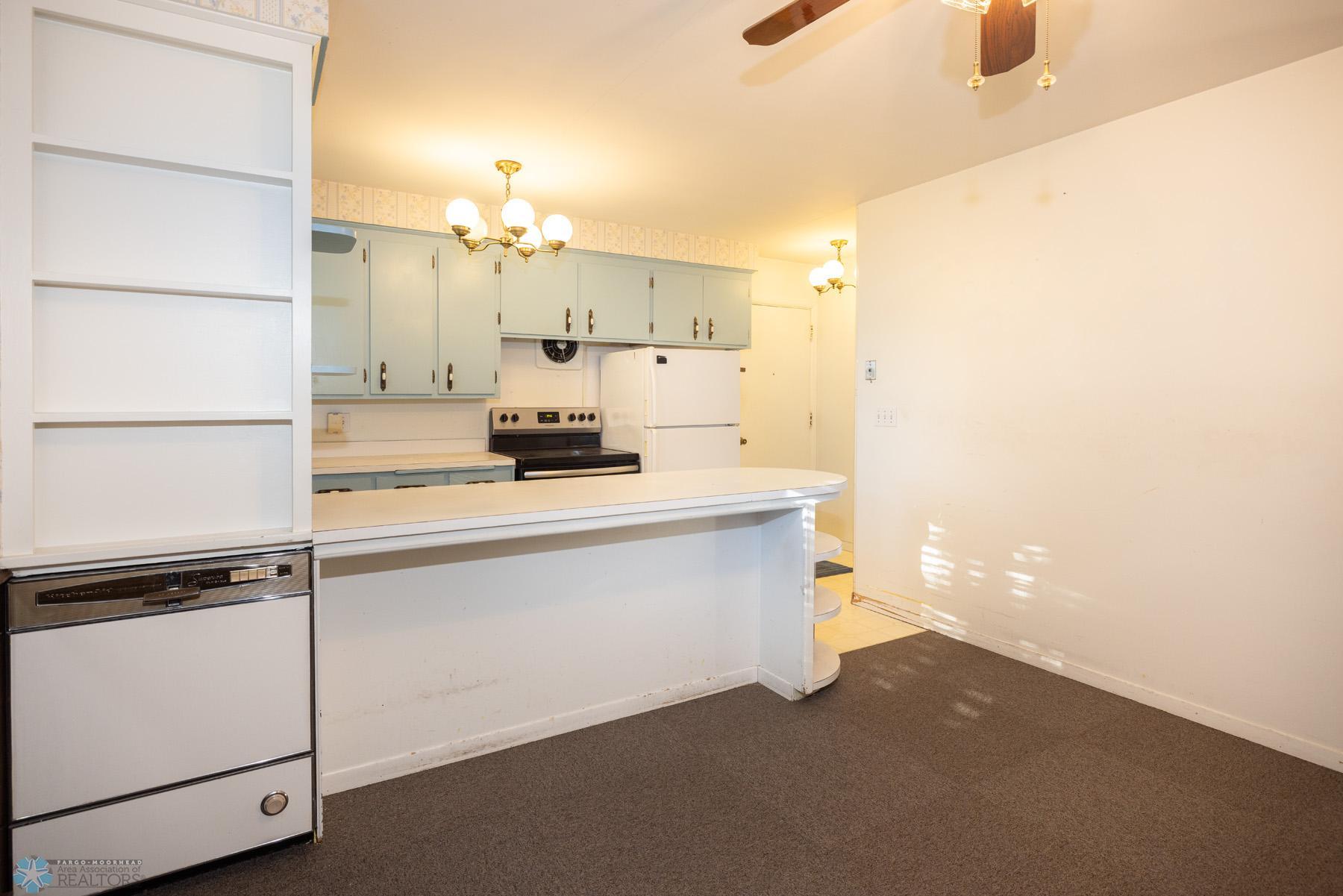 Kitchen with access to attached garage