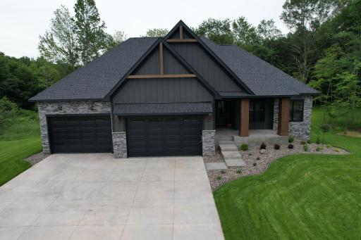 Full Landscaping, concrete edging, irrigation, outdoor water treatment system!