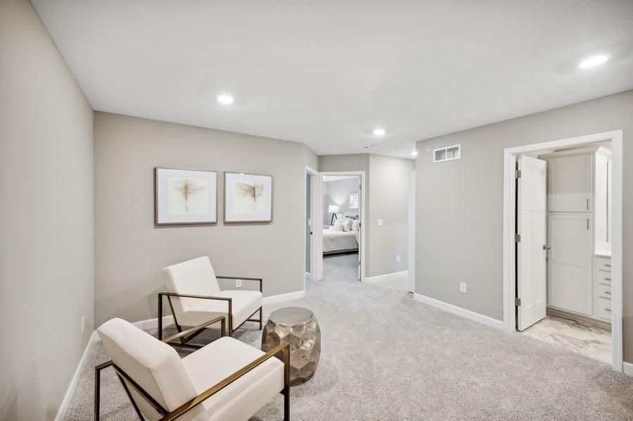 (Photo of decorated model, actual home's finishes vary) Relax, play and enjoy in the loft!