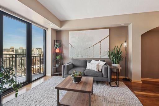 Another view of the living room area. 10 foot ceilings and wall of windows.