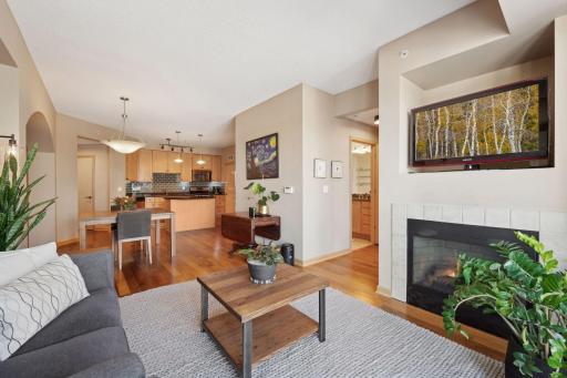 Another view of the main living area. A cozy gas fireplace to relax by. New lighting in halls and entry.